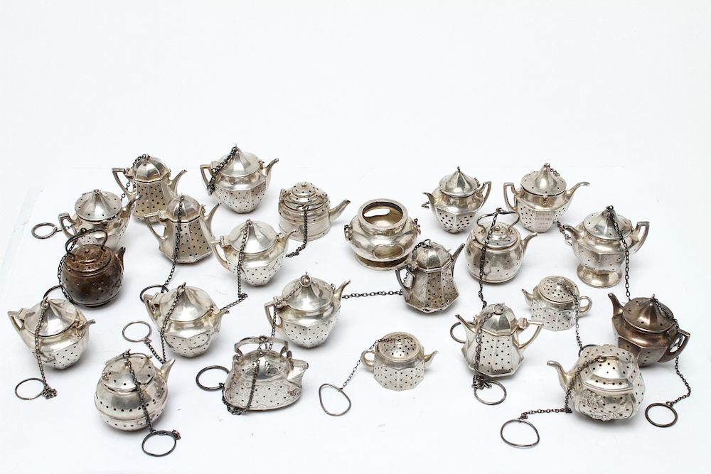 Appraisal: Sterling Silver Teapot Form Tea Balls Group of Sterling silver