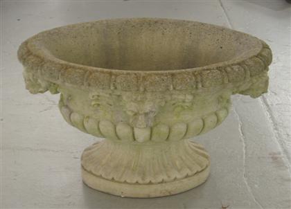 Appraisal: Pair of Neoclassical style poured stone garden urnsEach oval with