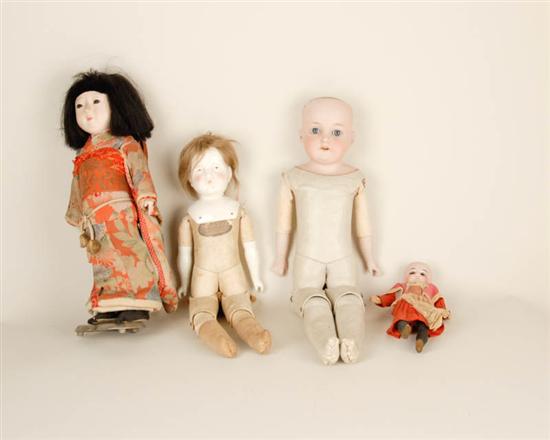 Appraisal: Four Dolls an Armand Marseilles bisque shoulder head marked A