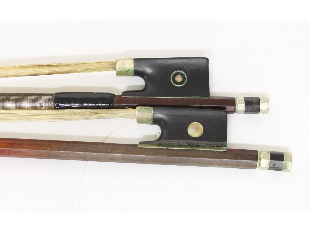 Appraisal: Two nickel mounted violin bows