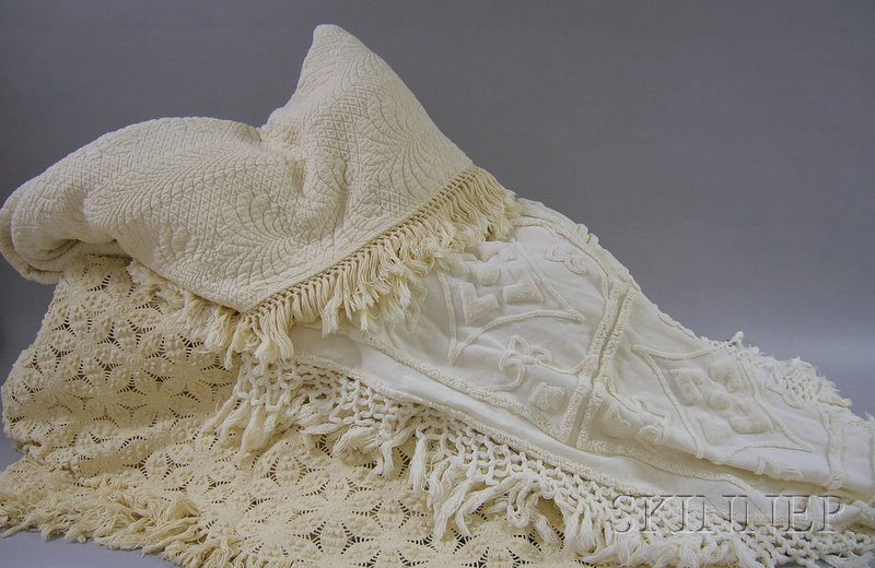 Appraisal: Three Bedcovers cream-colored crocheted handwrought bedcover in a repeating six-petal