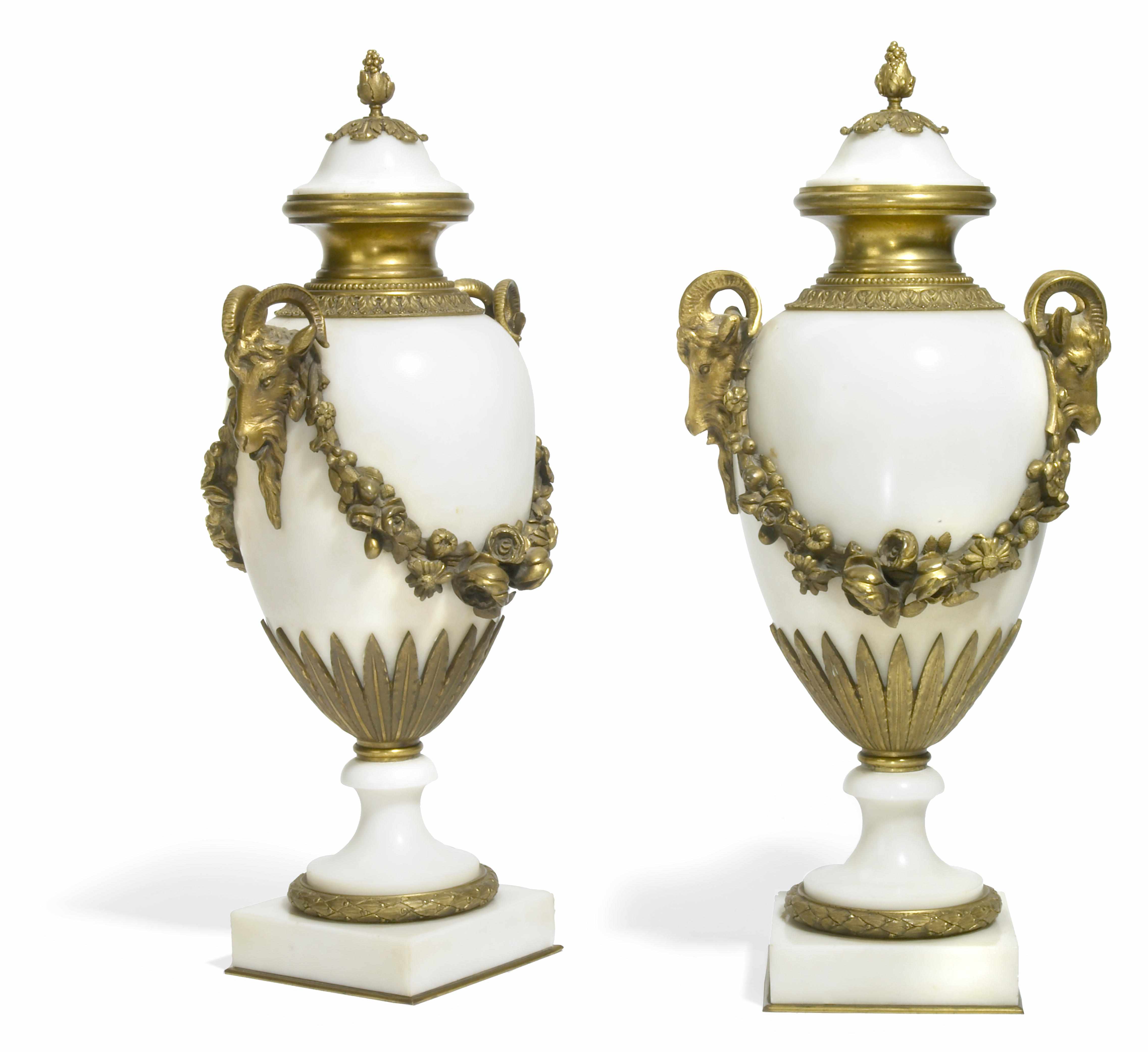 Appraisal: A pair of Louis XVI style gilt bronze mounted white