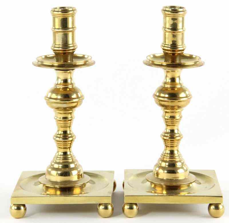 Appraisal: Pair of Contemporary Brass Candlestickssquare form base raised on four