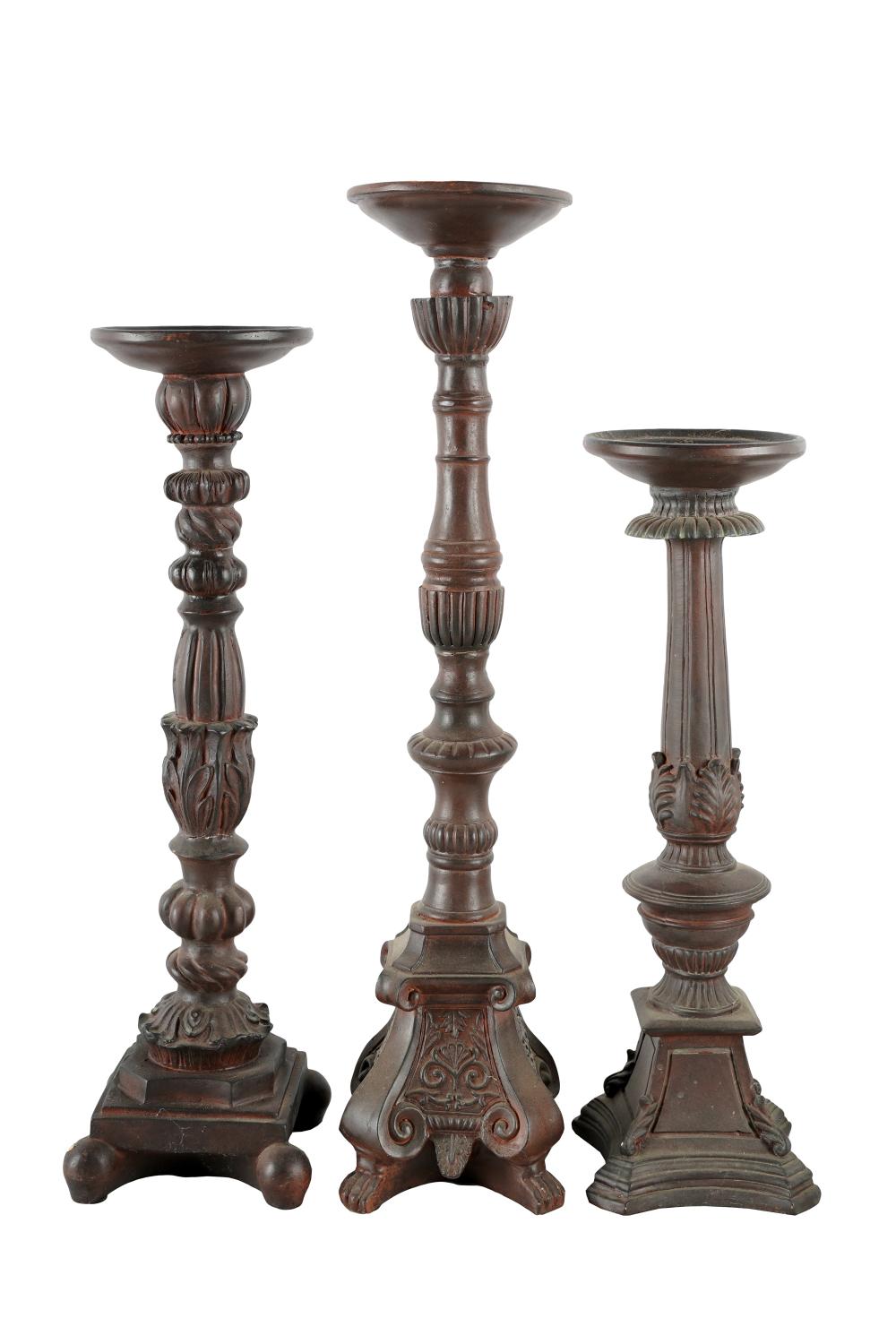 Appraisal: THREE GRADUATED CANDLESTICKScomposition Provenance The Estate of Barbara Beretich Artist