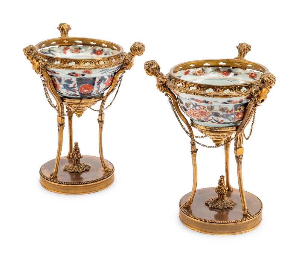 Appraisal: A Pair of French Gilt Bronze Mounted Chinese Porcelain Coupes