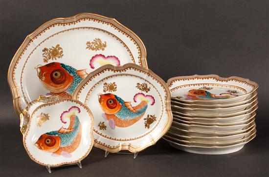 Appraisal: Mottahedeh Chinese Export style painted parcel-gilt porcelain -piece fish service