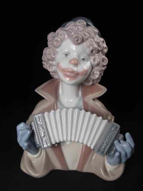 Appraisal: Lladro porcelain bust of a clown playing an accordion Signed