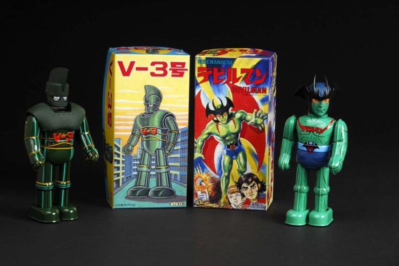 Appraisal: Lot of Tin Superhero Wind-Up Toys Description Japanese Made by