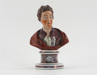 Appraisal: A pearlware bust of David Garrick raised on a purple