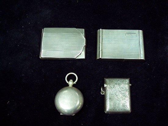 Appraisal: A sterling silver vesta case with match strike and engine