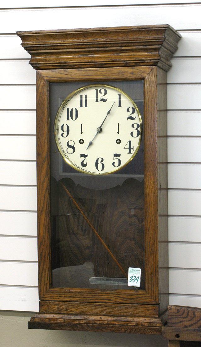 Appraisal: AN OAK CASED TIME RECORDING WALL CLOCK International Time Recording