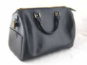 Appraisal: A zip top leather handbag by Louis Vuitton x cm