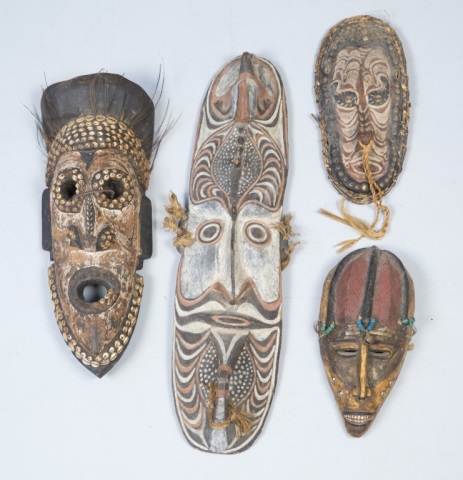 Appraisal: Four Hand Carved African Masks Largest H x W