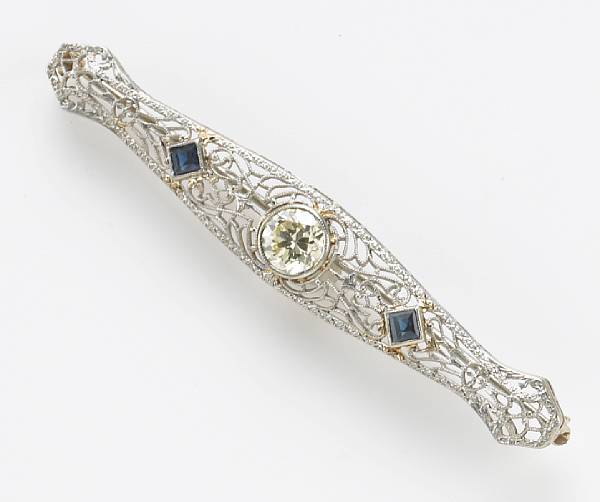 Appraisal: A diamond and synthetic sapphire brooch diamond weighing approximately carats