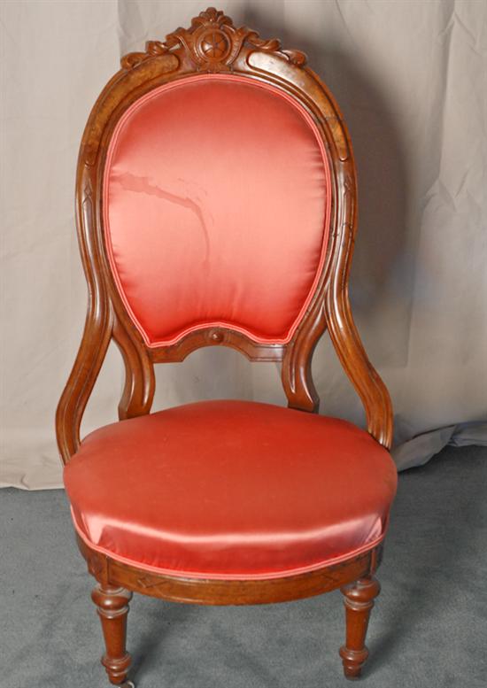 Appraisal: A th C Rococo Revival Hip-rest Chair having a carved