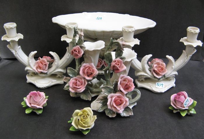 Appraisal: AN EIGHT PIECE GERMAN PORCELAIN TABLE DECORATION applied pink roses