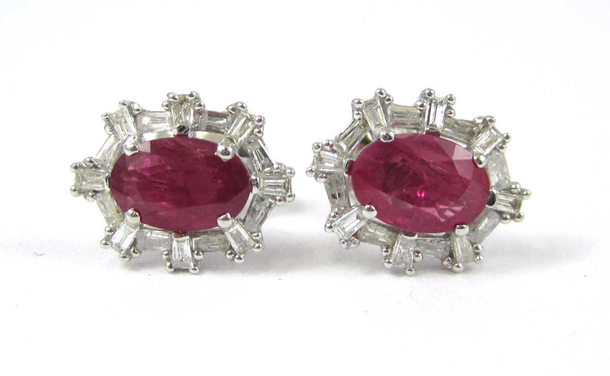 Appraisal: PAIR OF RUBY AND DIAMOND STUD EARRINGS each k white