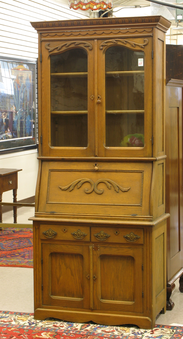 Appraisal: LATE VICTORIAN OAK SECRETARY BOOKCASE American late th century in