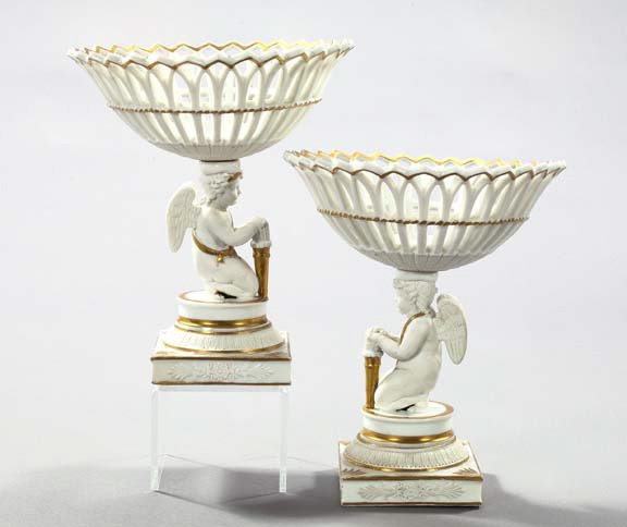 Appraisal: Attractive Pair of Paris Porcelain and Biscuit Reticulated Figural Corbeilles