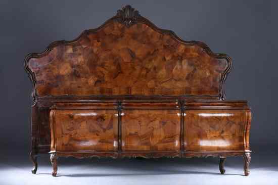 Appraisal: ITALIAN ROCOCO REVIVAL OYSTER VENEERED WALNUT KING-SIZE BED FRAME th