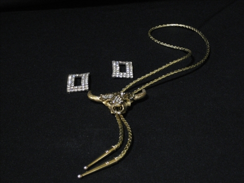 Appraisal: TWO LARGE RHINESTONE ITEMS One is a bolo type necklace