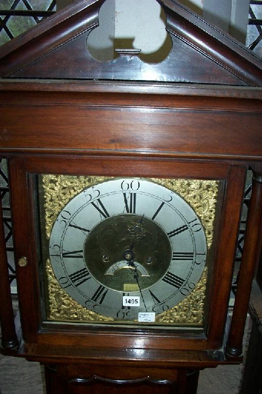 Appraisal: A Georgian walnut longcase clock with column supports the full