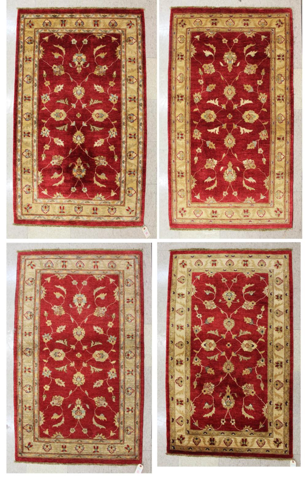 Appraisal: FOUR SIMILAR HAND KNOTTED ORIENTAL AREA RUGS Pakistani-Persian overall floral