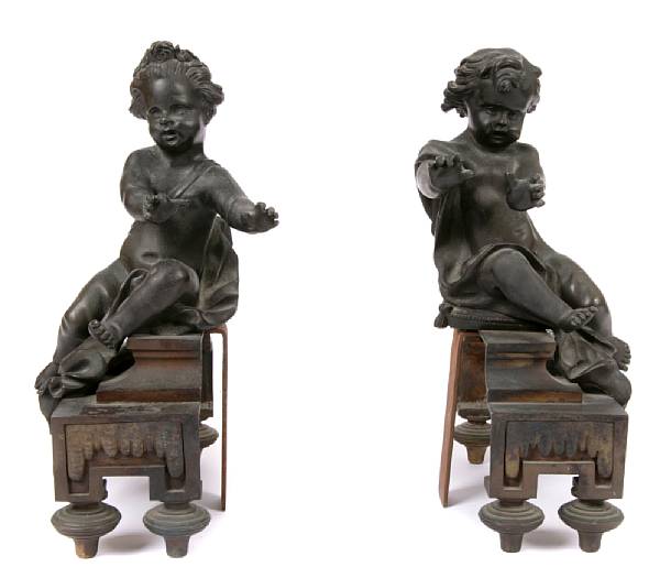 Appraisal: A pair of Louis XVI style bronze chenets height in