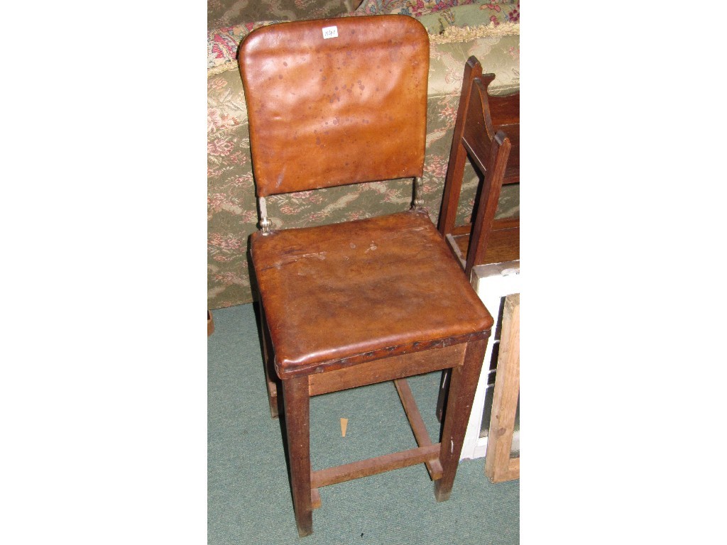 Appraisal: Open bookcase and chair with folding back rest