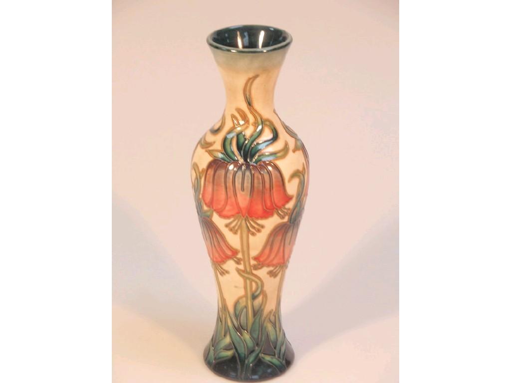 Appraisal: A Moorcroft baluster vase decorated with stylised flowers on a