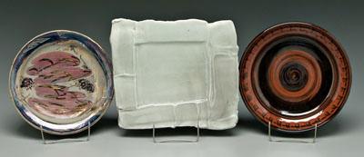 Appraisal: Three large ceramic plates bowls slab built plate with foot