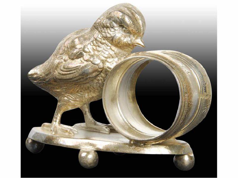 Appraisal: Large Chick Figural Napkin Ring Description Oval ball-footed base Marked