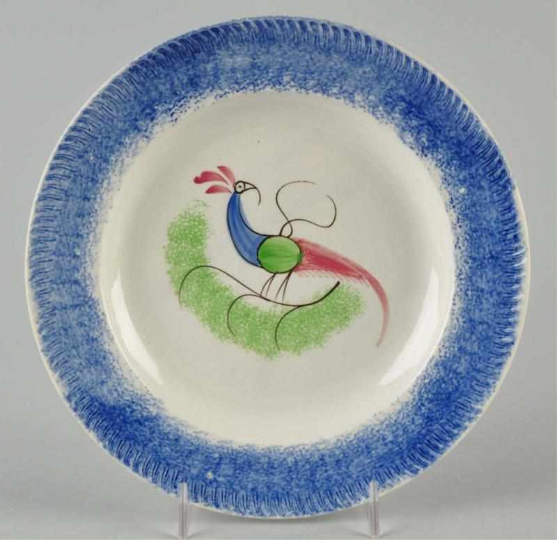 Appraisal: Spatterware Plate Description Circa Blue with peafowl design Condition Excellent