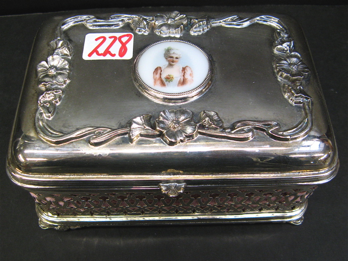 Appraisal: AMERICAN ORNATE SILVER PLATED JEWELRY BOX the hinged lid with