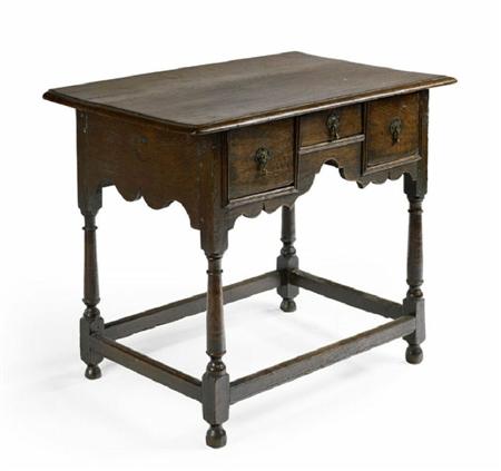 Appraisal: A Queen Anne oak side table the moulded rectangular top