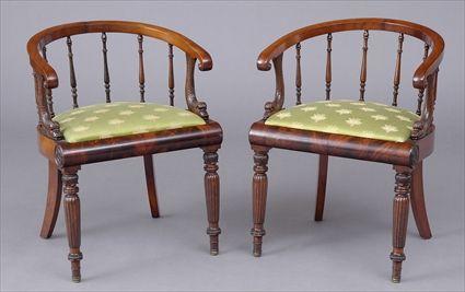 Appraisal: PAIR OF REGENCY CARVED MAHOGANY TUB-BACK ARMCHAIRS Each curved top