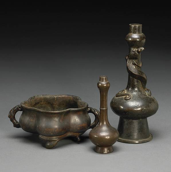 Appraisal: A group of three small cast bronze vessels Including a