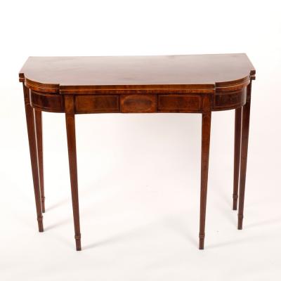 Appraisal: A George III mahogany fold over card table inlaid boxwood