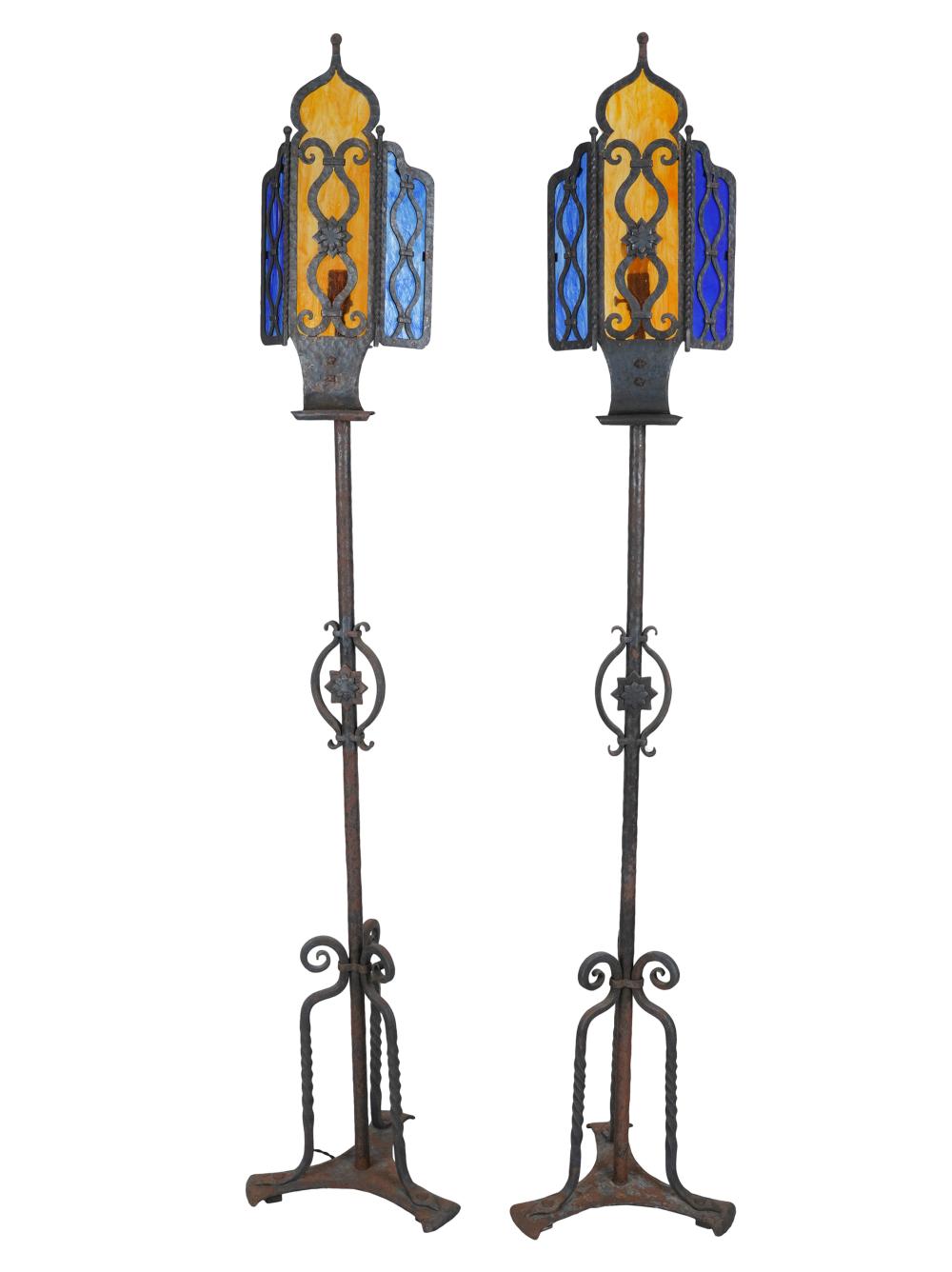 Appraisal: PAIR OF SPANISH REVIVAL STYLE IRON GLASS FLOOR LAMPS s