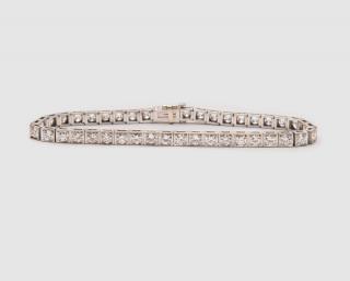 Appraisal: Platinum and Diamond Line Bracelet PLATINUM AND DIAMOND LINE BRACELETfeaturing