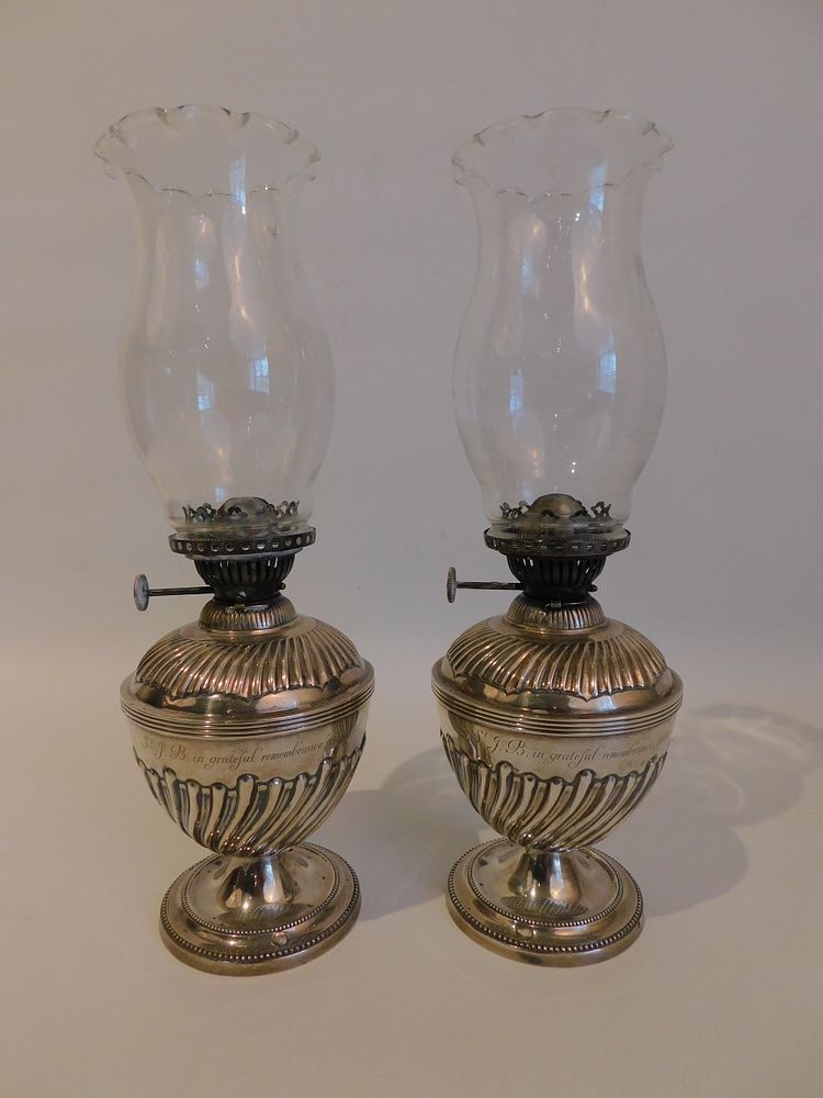 Appraisal: PAIR STERLING SILVER LAMPS Pair of rare English sterling silver