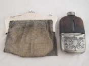 Appraisal: A white metal tests silver lady's evening bag with pierced