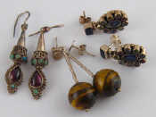 Appraisal: A mixed lot comprising a pair of multi gem earrings