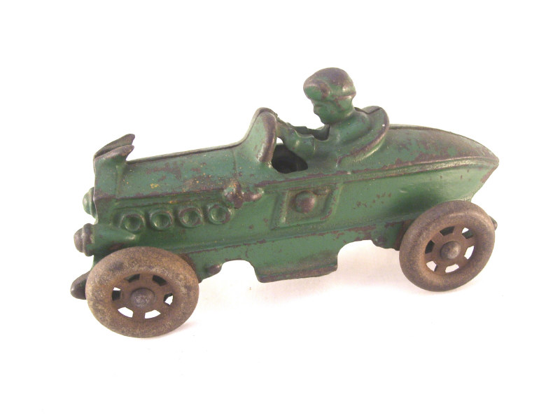 Appraisal: Cast Iron Roadster Race Car Original green paint Measures high