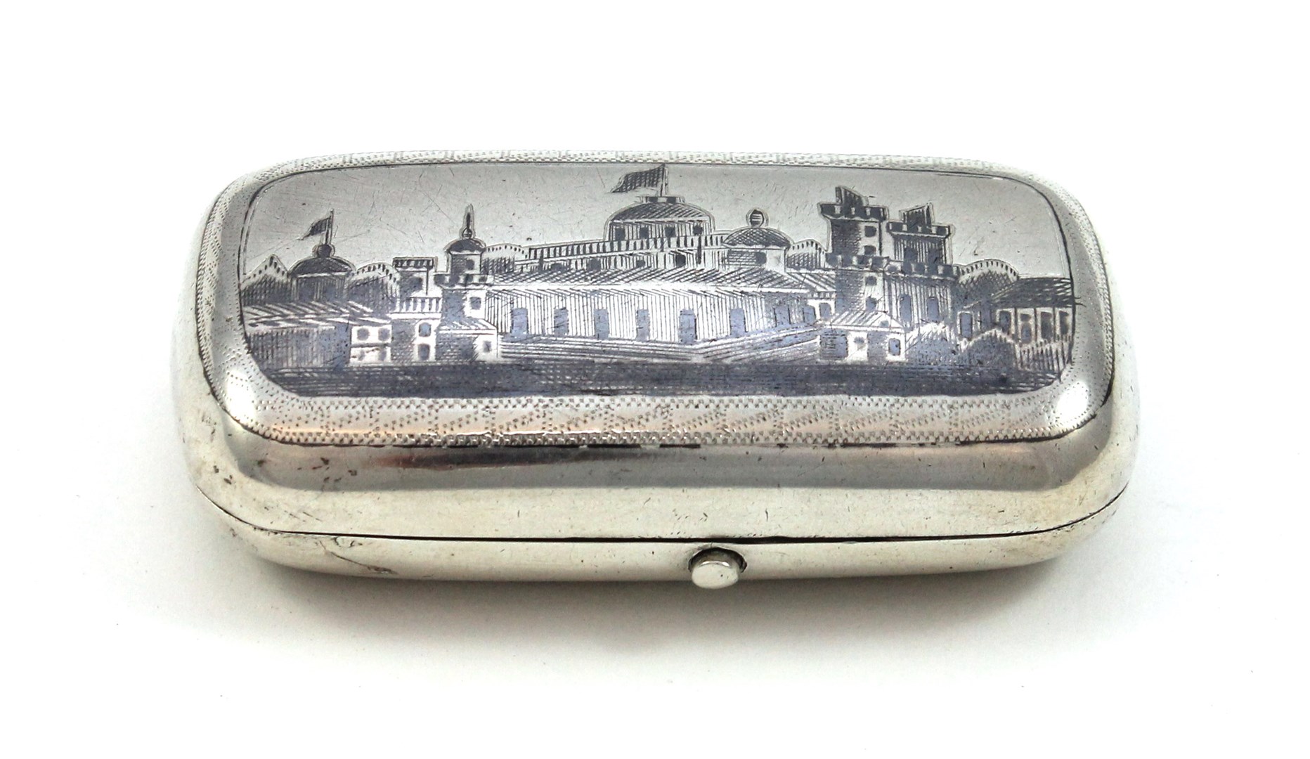 Appraisal: A Russian silver and niello decorated curved rectangular cigarette box