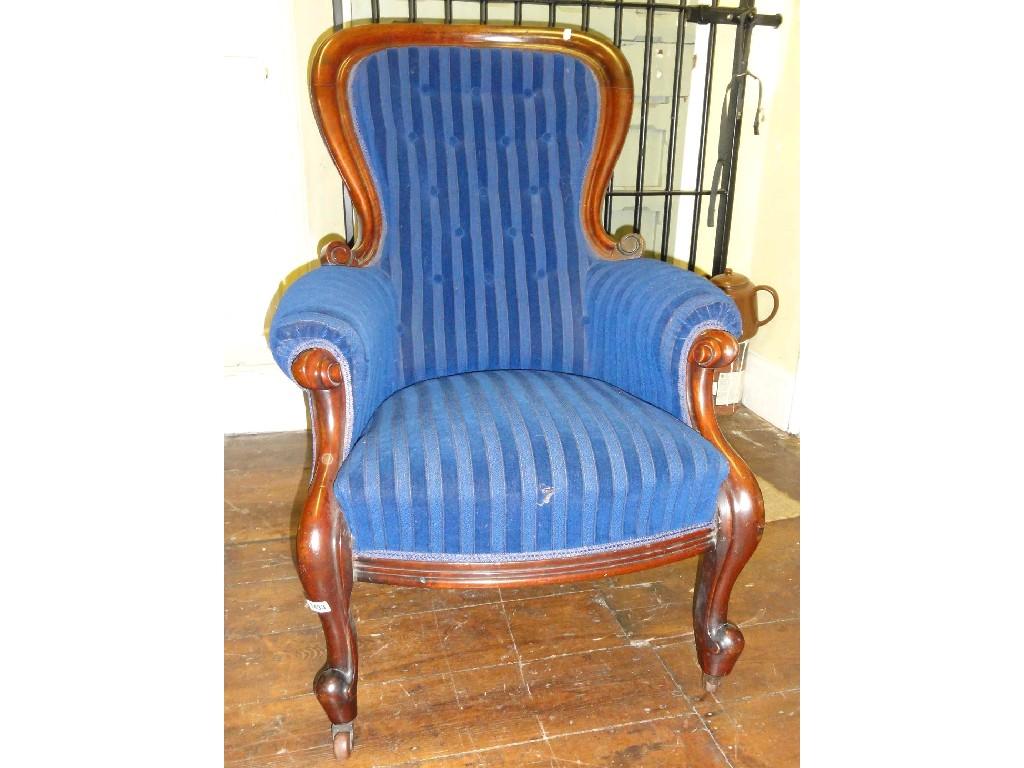 Appraisal: A Victorian spoon back drawing room chair with blue striped