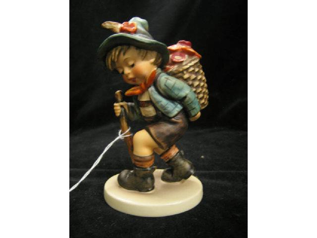 Appraisal: Hummel Figurine Flower Vendor Goebel bee mark