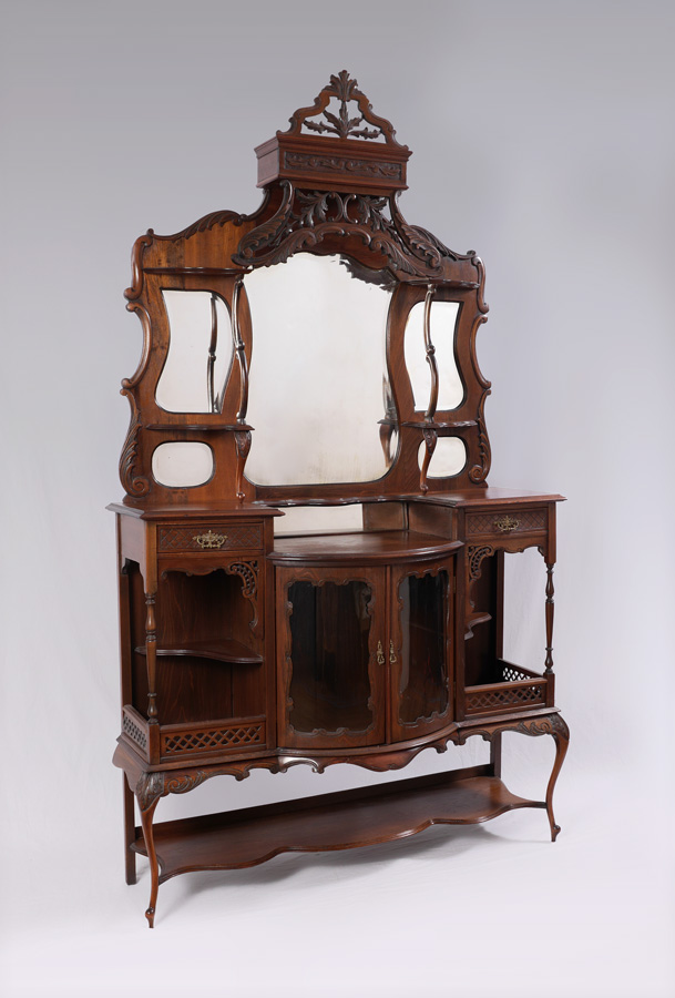 Appraisal: CARVED WALNUT EDWARDIAN BOWFRONT ETAGERE Shaped crest with open work