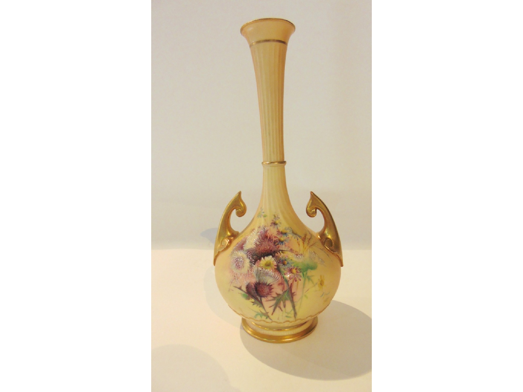 Appraisal: A Royal Worcester blush ivory two handled vase with painted