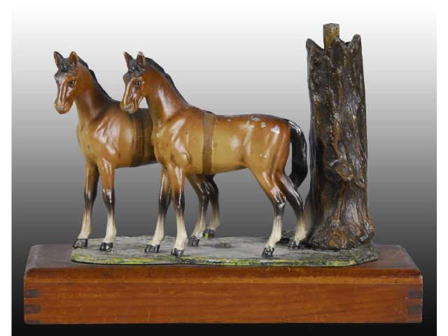 Appraisal: Double Horse Match Striker and Cigar Lighter Description Metal on